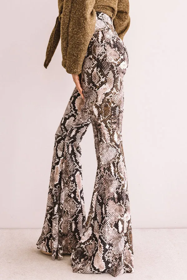 Leave Em' Wanting More Snake Print Flare