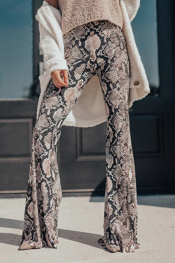 Leave Em' Wanting More Snake Print Flare