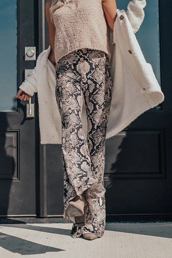 Leave Em' Wanting More Snake Print Flare